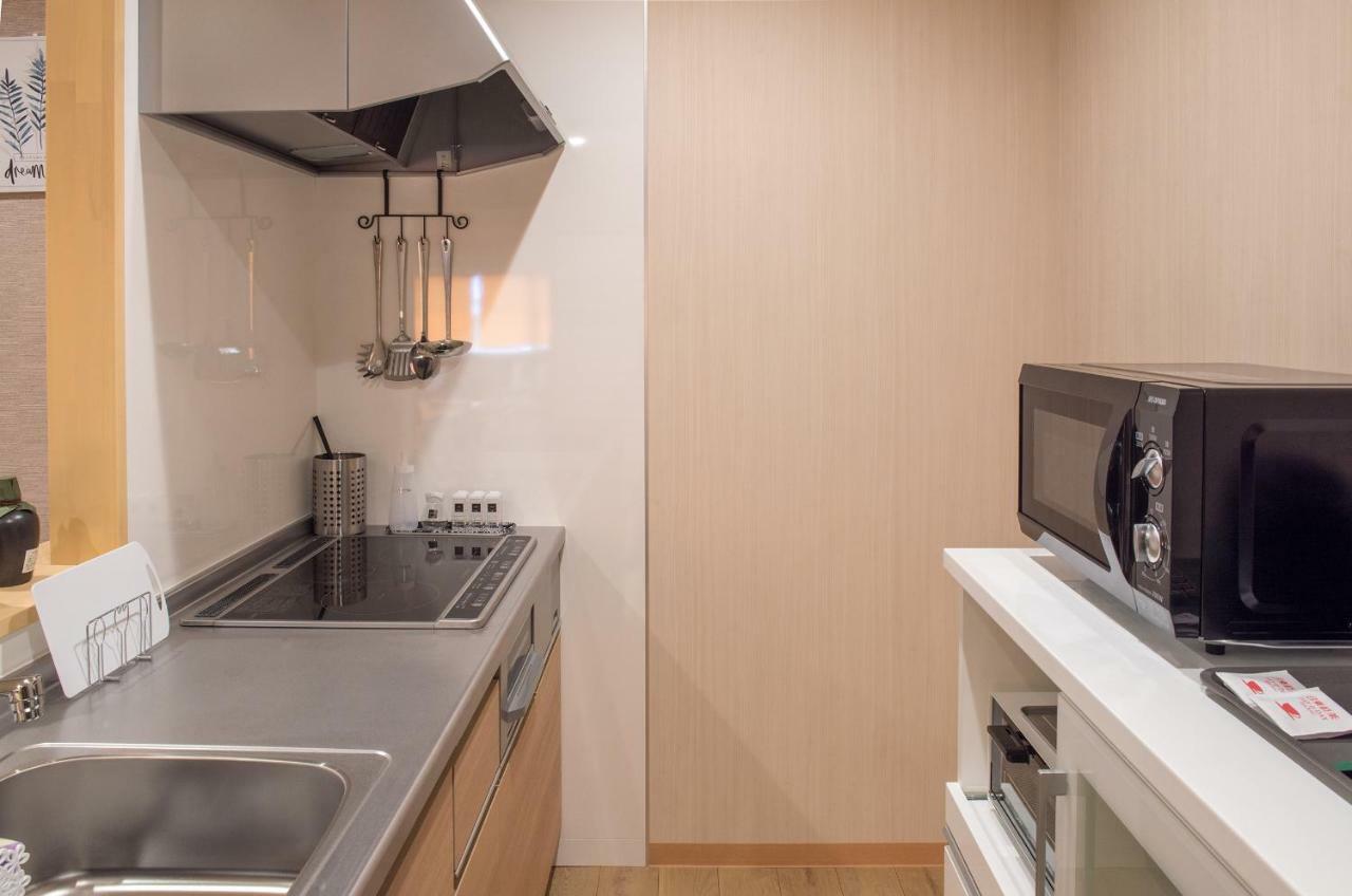 Hakka Apartamento Beppu Exterior foto